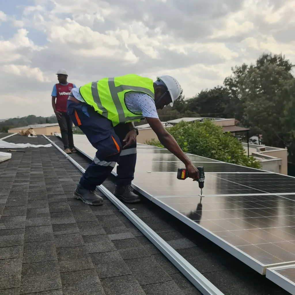 Installing solar panels at Nyari Estate Nairobi, Kenya.